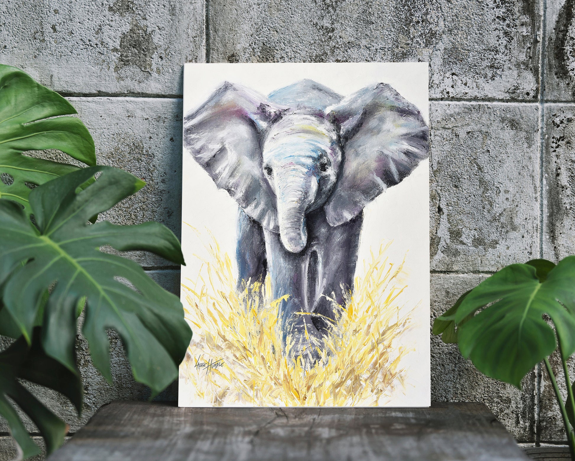 Elephant art print displayed in a modern tropical setting for a playful touch